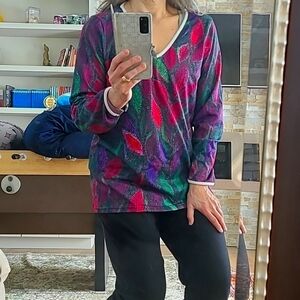 Long sleeve multicolored jewel toned women's top. MissLook, size large.